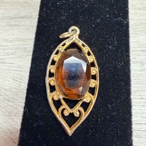 Elegant Gold Tone and Brown Pendant